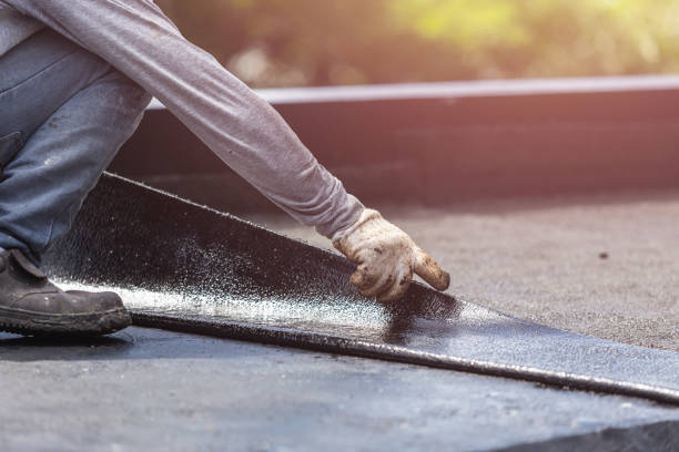 Professional Waterproofing technician working in Bayonne, NJ